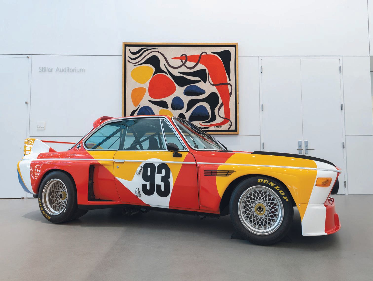 An installation view of Special Guest: Calder BMW Art Car in the Norton’s Gilbert
and Ann Maurer Auditorium Lobby PHOTO BY ASHLEY KERR