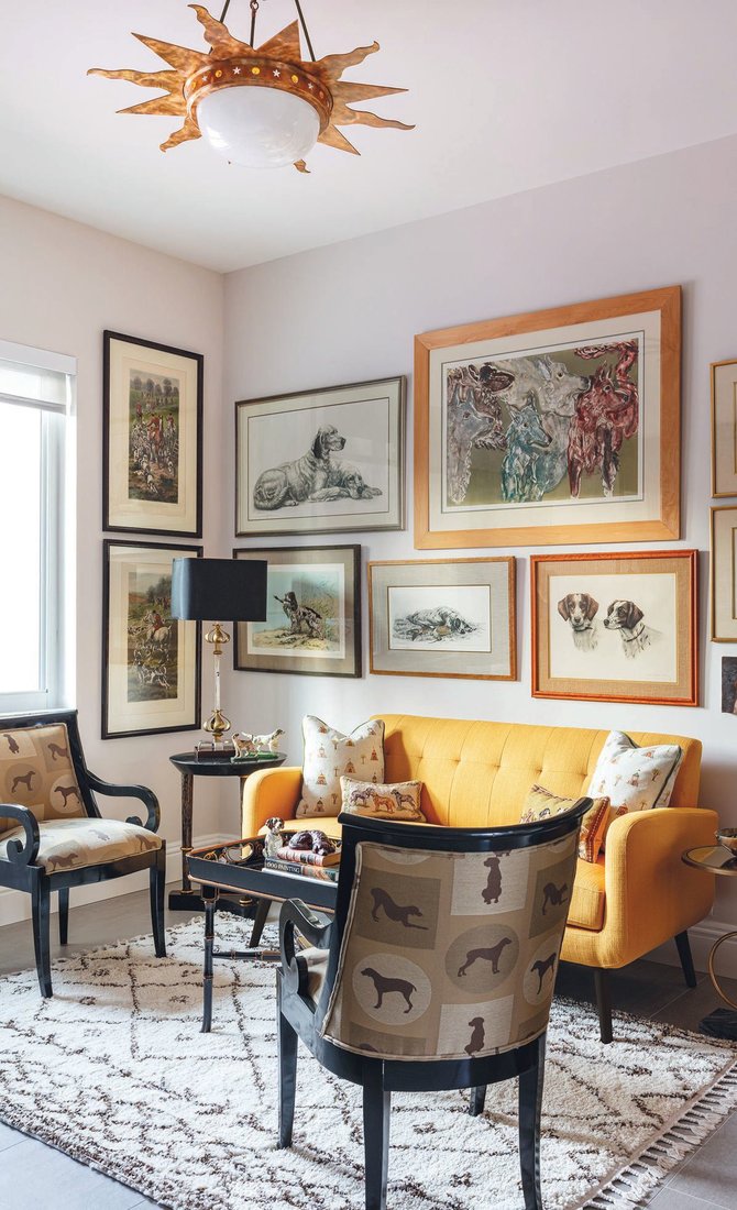 One of the most often-used rooms in the house, the cocktail room houses dog paintings and drawings collected by the homeowners for many years. PHOTOGRAPHED BY NICK SARGENT
