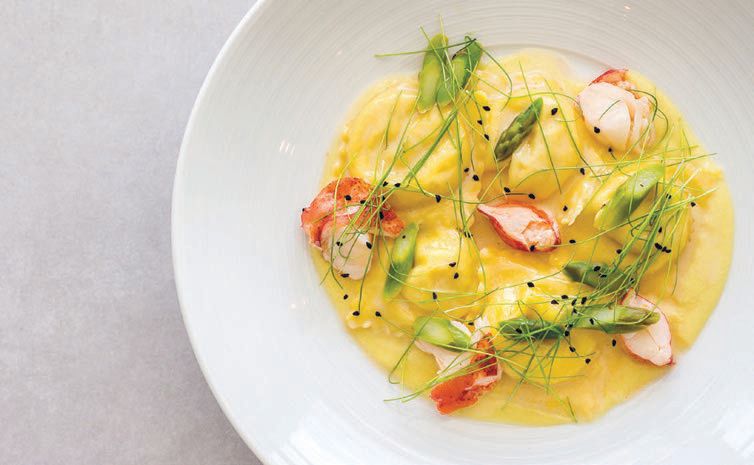 Nosh on Ember Grill’s reimagined classics such as lobster ravioli with sweet corn. COURTESY OF THE RAY