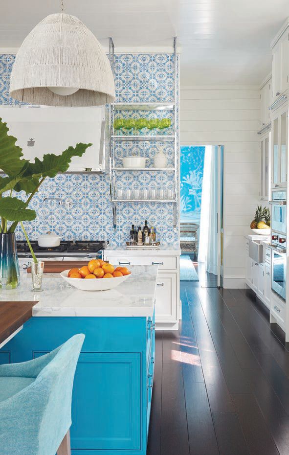 A sea of cerulean washes over the kitchen PHOTOGRAPHED BY PERNILLE LOOF